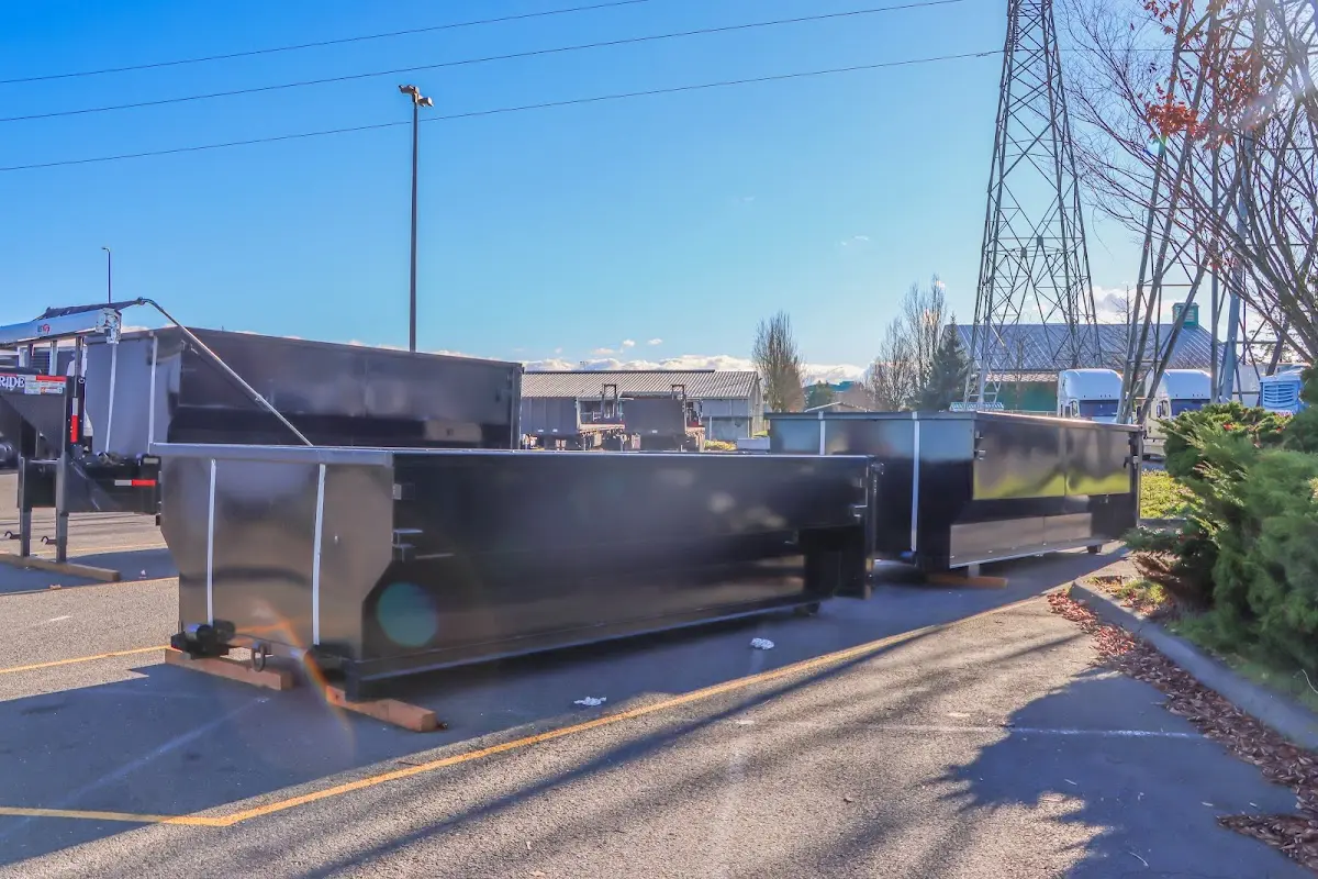 Roll-off dumpster ready for waste disposal at job site for 15 Yard Dumpster Rental in Stonegate